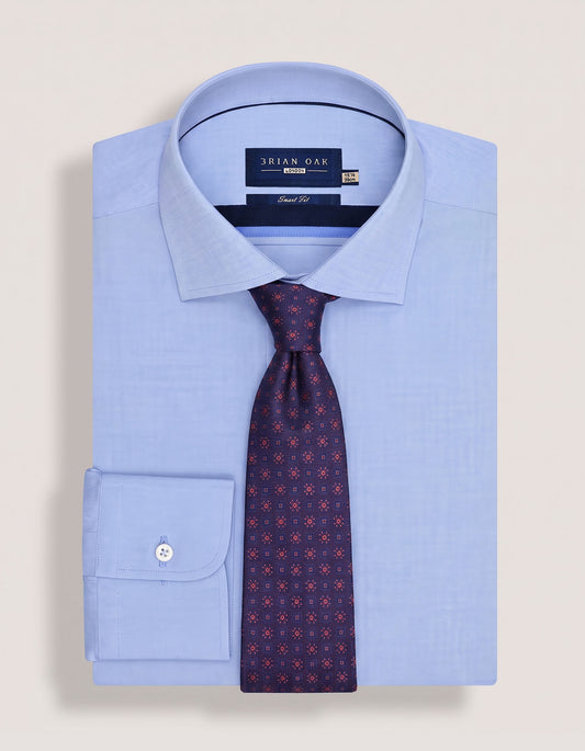 Cravate fleurie en soie bleu marine et rouille