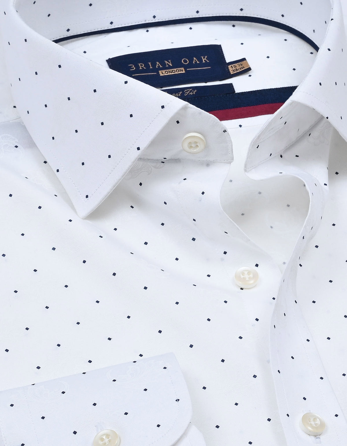 Chemise blanche à pois bleu marine