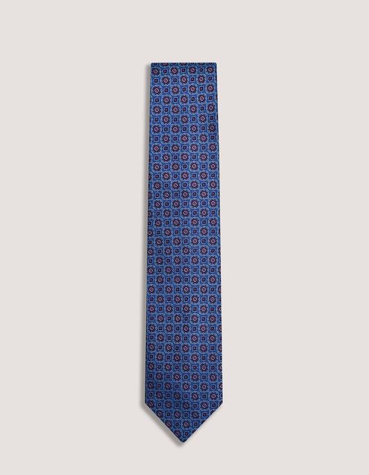 Corbata de seda con estampado floral en color azul baya