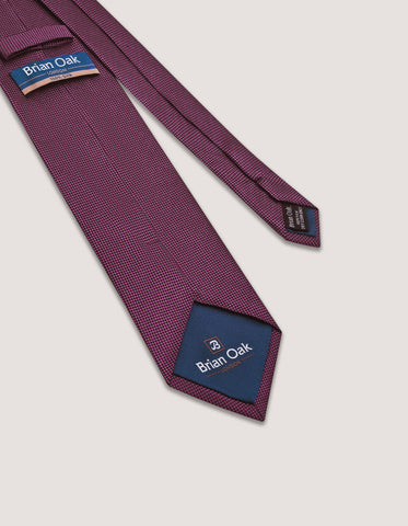 Corbata de seda burdeos con estampado propio